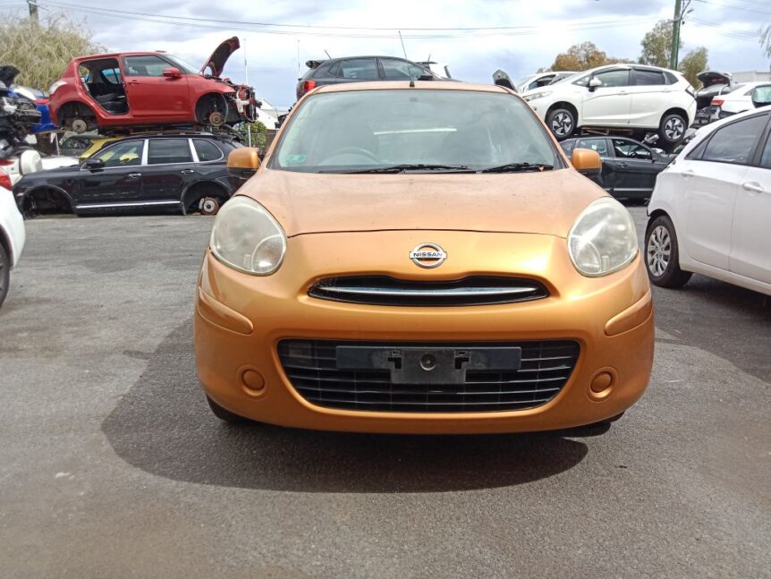 Nissan Micra 2012 orange Wrecking