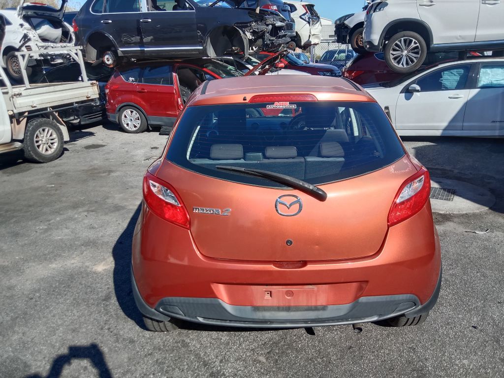 Mazda 2 2010 orange Wrecking